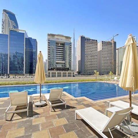 Take in the city views from the swimming pool