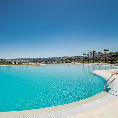 Take a refreshing dip in your communal pool to cool off from the Spanish sun