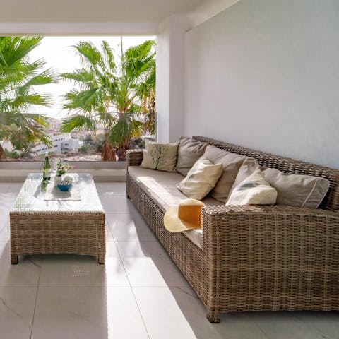 Relax with a book and a glass of wine on your private sun-drenched balcony