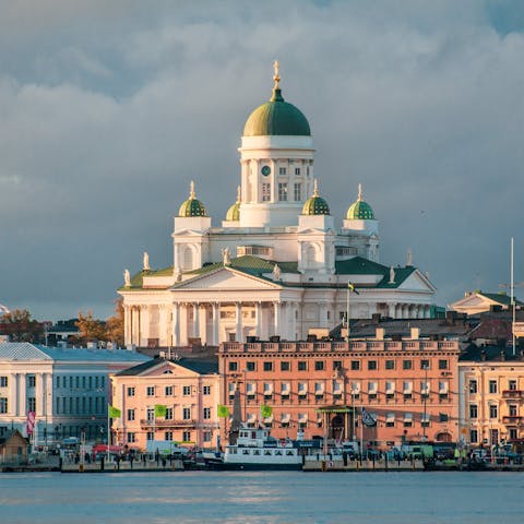 Stroll down to Helsinki Cathedral with its historical statues