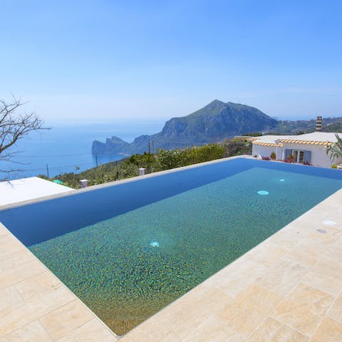 Float in the private pool beneath a cloudless sky
