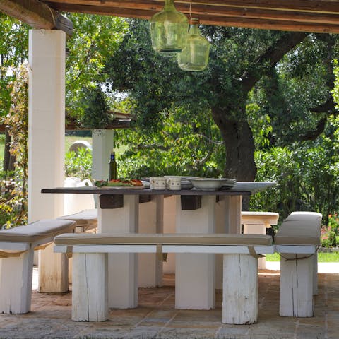 Cook some Puglian food on the barbecue and enjoy at the alfresco dining table