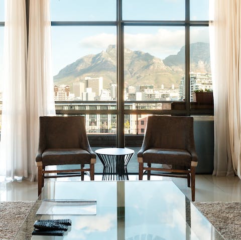 Enjoy the panoramic views of Table Mountain through the floor-to-ceiling windows