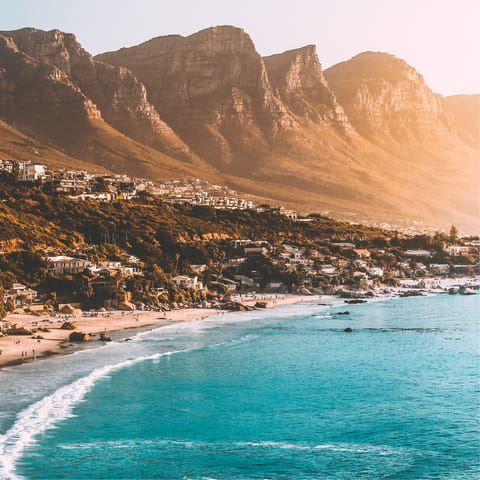 Visit the glorious beaches of Cape Town, famed for their stunning mountain backdrop