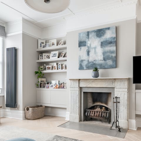 Get cosy by the marble fireplace on a chilly English evening