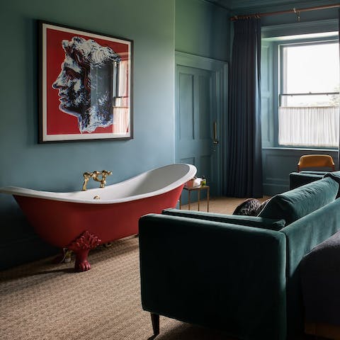 Have an evening soak in one of the home's freestanding baths