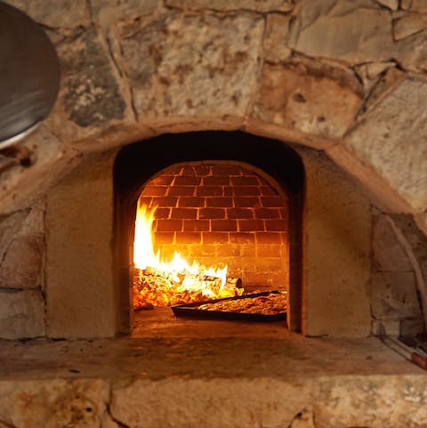 Whip up a real Italian pizza in the outdoor wood-burning oven
