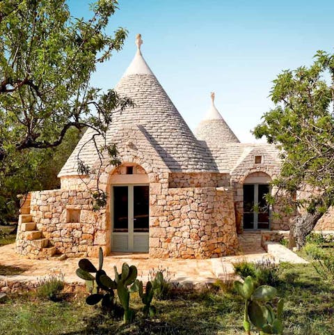 Live like a local in traditional trulli-style bedrooms