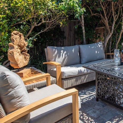 Relax in the sunshine from the secluded garden