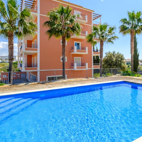 Enjoy a cool dip in the buildings communal pool