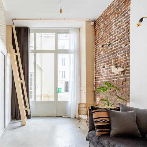 Let natural light stream in as you admire the exposed brickwork