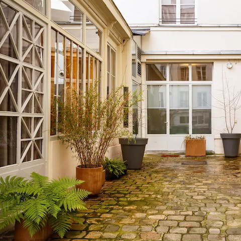 Sip chenin blanc in the peaceful setting of the shared courtyard