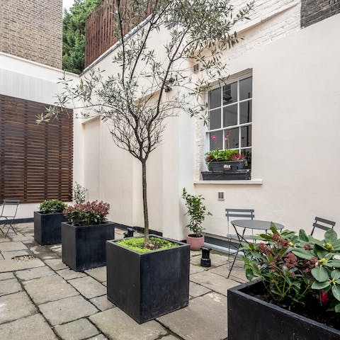 Relax in the home's communal courtyard