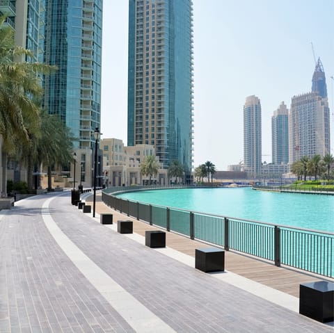 Stroll along the turquoise water of Dubai Marina, a five-minute walk away