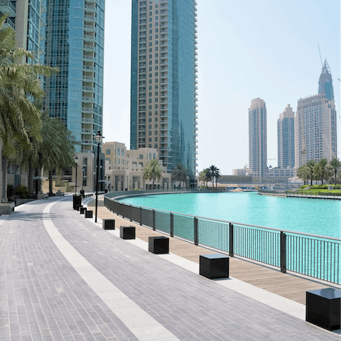 Stroll along the turquoise water of Dubai Marina, a five-minute walk away
