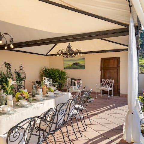 Host dinner parties in the gazebo's outdoor dining space