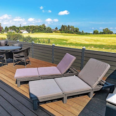 Spend sunny morning lounging on your private deck
