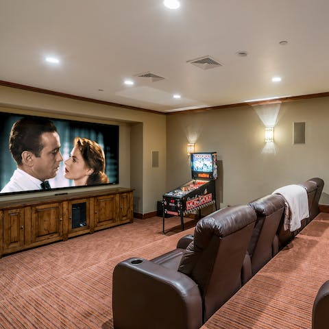 Sink into the comfy seats of the home theatre