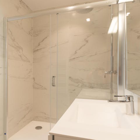 Take a long soak in the marble ensuite bathrooms 