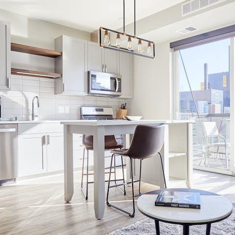 Feast on views over breakfast from the living area's floor-to-ceiling windows