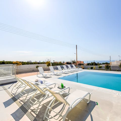 Laze on the poolside loungers after a morning exploring Coral Bay