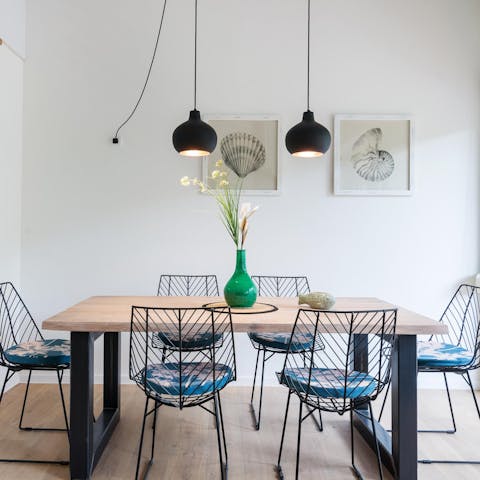 Gather around the stylish dining set to tuck into tapas suppers together