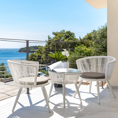 Enjoy breakfast out on the balcony with a sea breeze on your face