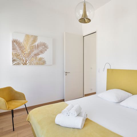 Look forward to waking up in the mellow yellow bedroom