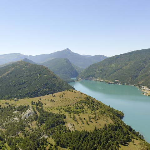 Admire the panoramic views of the French Alps and Lake Castillon