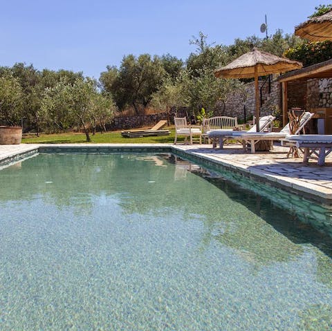 Spend blissful hours relaxing by the glistening pool, soaking in the gorgeous natural surroundings, occasionally taking a dip