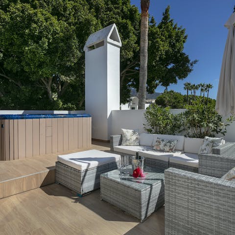 Make your way up to the roof terrace for long soaks in the jacuzzi