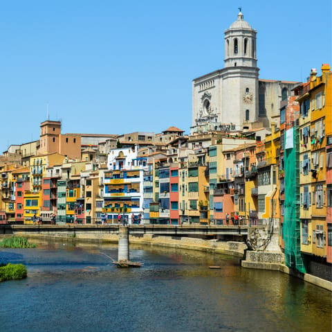 Explore Girona and its medieval architecture, just under forty minutes away by car