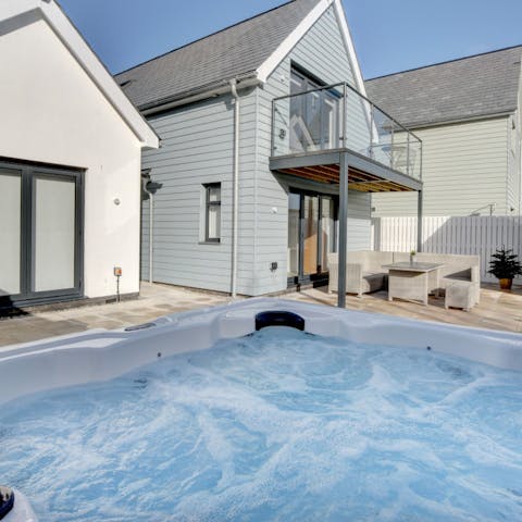 Relax after a busy day in the private hot tub