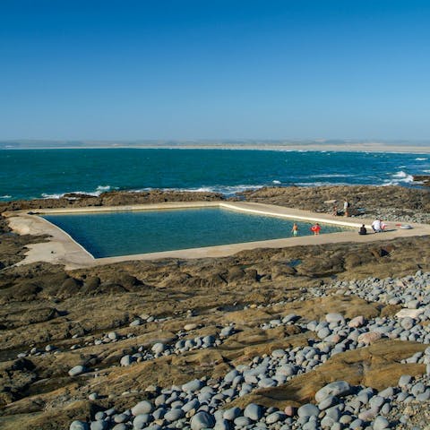 Take a dip in the seawater pool at Pebble Ridge, just a fifteen-minute walk away