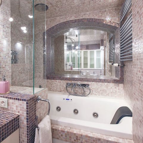 Close your eyes and feel at peace in the mosaiced bathtub