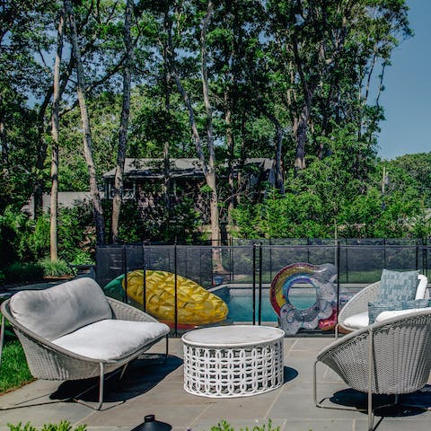 Lounge by the solar pool, fenced off to keep children safe