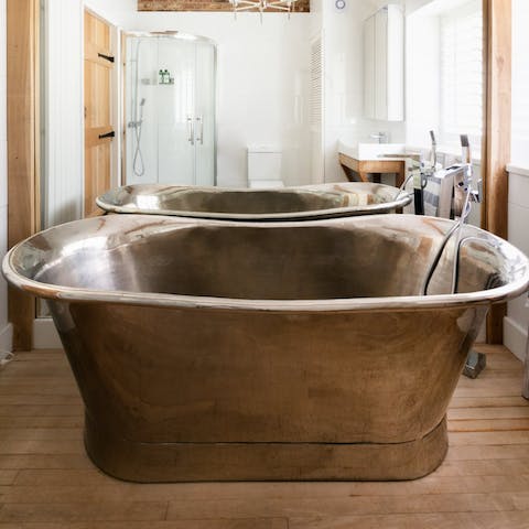 Enjoy a soak in the free-standing copper bath – with room for two