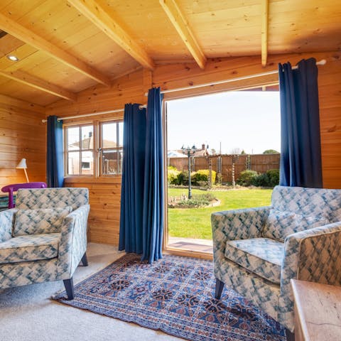 Get cosy in the log cabin – it has wi-fi so you can even work if you need to