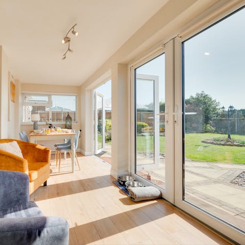 Enjoy breakfast in the sun-soaked conservatory