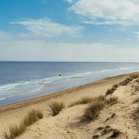 Fly kites at beautiful Heacham South Beach – it's a five-minute drive