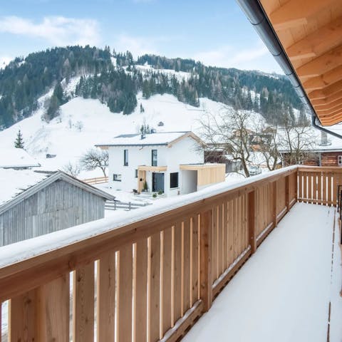 Spend the evening sipping Glühwein on the wooden balcony
