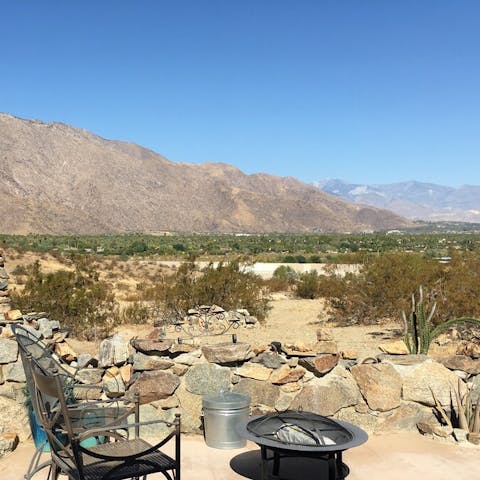 Sit out by the fire pit and take in the mountain views