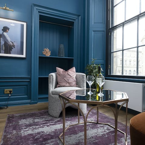 Take a seat on the comfy armchair after exploring Edinburgh and pour a glass of wine