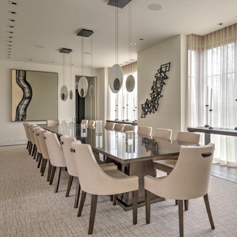 Host a big dinner in the modern art-filled dining room