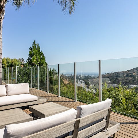 Take in the impressive views over Cahuenga Pass and Mulholland Drive towards Hollywood