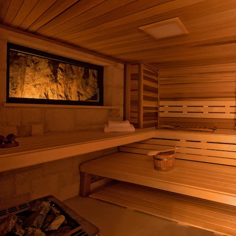 Get a serious sweat on in the home's wood-panelled sauna