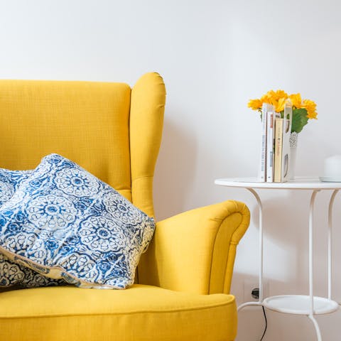 Sink into the plump yellow armchair after a day of exploring the city on foot