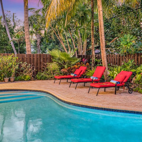 Relax by the private pool in the Florida sunshine