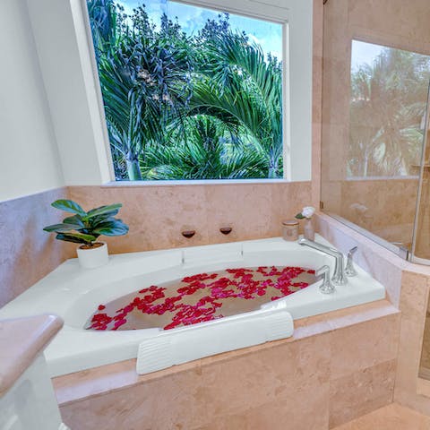 Enjoy a luxurious soak in the main bedroom's Jacuzzi bathtub