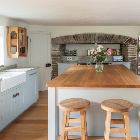 Cook up family favourites in the country-style kitchen